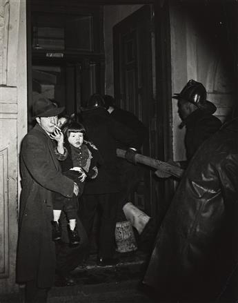 WEEGEE [ARTHUR FELLIG] (1899-1968) Fire Rescue, New York. Circa 1940; printed 1960s.                                                             